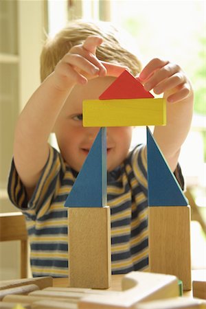 simsearch:693-06379407,k - Boy Building Tower from Building Blocks Stock Photo - Rights-Managed, Code: 700-00067727