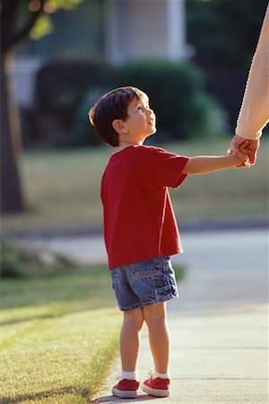 Kid Holding Hand Of Grand Parents Stock Photos Page 1 Masterfile