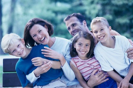 Portrait of Family on Park Bench Toronto, Ontario, Canada Stock Photo - Rights-Managed, Code: 700-00068424