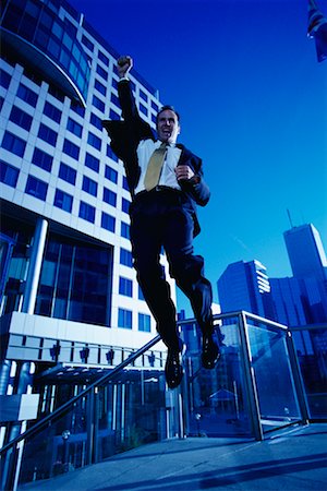 ecstatic man canada - Ecstatic Businessman Jumping in Air, Toronto, Ontario, Canada Stock Photo - Rights-Managed, Code: 700-00068524