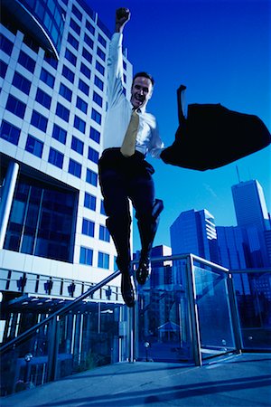 ecstatic man canada - Ecstatic Businessman Jumping in Air, Toronto, Ontario, Canada Stock Photo - Rights-Managed, Code: 700-00068525