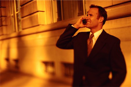 simsearch:700-00159009,k - Businessman Using Cell Phone Outdoors Stock Photo - Rights-Managed, Code: 700-00068538