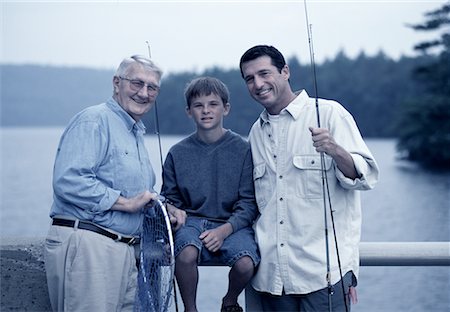 portrait of young boy fishing - Portrait of Grandfather, Father And Son on Bridge with Fishing Gear Stock Photo - Rights-Managed, Code: 700-00068625