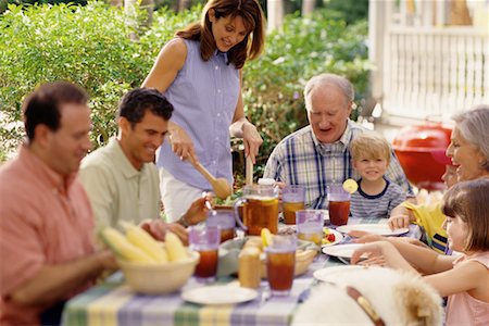 family dog grandparents parents child - Family at Table, Eating Outdoors Stock Photo - Rights-Managed, Code: 700-00068702