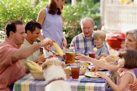 family dog grandparents parents child - Family Sitting at Table, Eating Outdoors Stock Photo - Rights-Managed, Code: 700-00068703