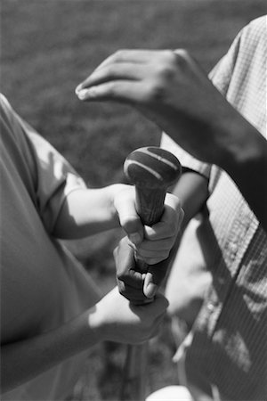 Close-Up of Children's Hands on Baseball Bat Stock Photo - Rights-Managed, Code: 700-00069315