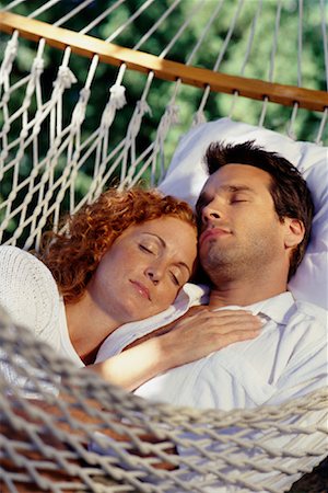 pictures of men sleeping in hammocks - Couple Sleeping in Hammock Stock Photo - Rights-Managed, Code: 700-00069377