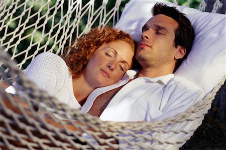 pictures of men sleeping in hammocks - Couple Sleeping in Hammock Stock Photo - Rights-Managed, Code: 700-00069381