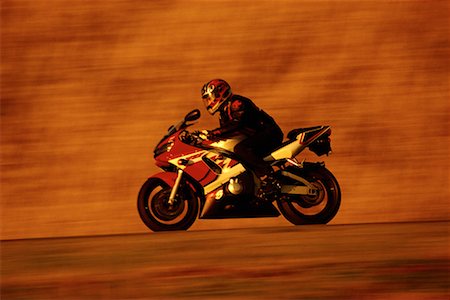 Motorcyclist Speeding on Road Woodbridge, Ontario, Canada Stock Photo - Rights-Managed, Code: 700-00069624