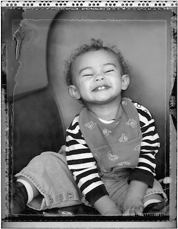Portrait of Child Sitting in Chair Stock Photo - Rights-Managed, Code: 700-00069915