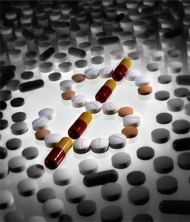 dollar sign of pills - Scattered Pills Forming Dollar Sign Stock Photo - Rights-Managed, Code: 700-00069922