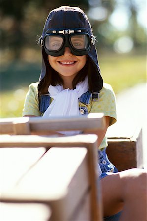 pilots with scarves - Portrait of Girl Wearing Goggles Sitting in Soapbox Car Stock Photo - Rights-Managed, Code: 700-00069932