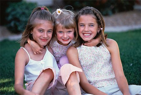 simsearch:640-02953238,k - Portrait of Three Girls Sitting Outdoors Stock Photo - Rights-Managed, Code: 700-00060169