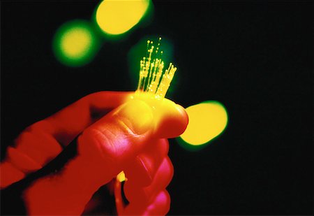 fiber optics and person - Close-Up of Hand Holding Fiber Optics Stock Photo - Rights-Managed, Code: 700-00060203