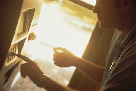 Man Using Bank Machine Stock Photo - Rights-Managed, Code: 700-00060255