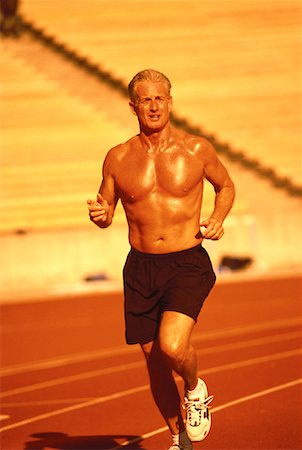simsearch:700-00060793,k - Mature Man Running on Track Stock Photo - Rights-Managed, Code: 700-00060729
