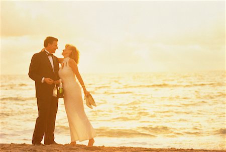 evening dress on beach - Couple in Formal Wear on Beach With Champagne and Glasses Stock Photo - Rights-Managed, Code: 700-00060816