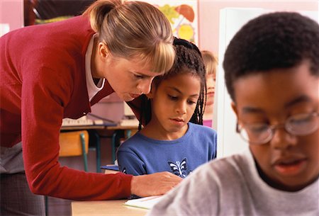 pierre tremblay - Female Teacher Helping Girl Use Computer in Classroom Stock Photo - Rights-Managed, Code: 700-00060851