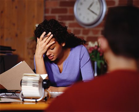 Two People in Meeting in Office Woman with Hand on Head Stock Photo - Rights-Managed, Code: 700-00060919