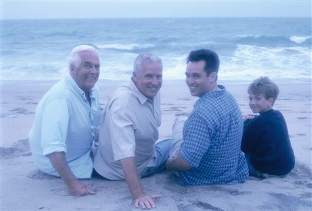 Portrait of Four Generations of Men Sitting on Beach Foto de stock - Con derechos protegidos, Código: 700-00061074