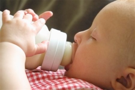 Close-Up of Baby Drinking from Bottle Stock Photo - Rights-Managed, Code: 700-00061128