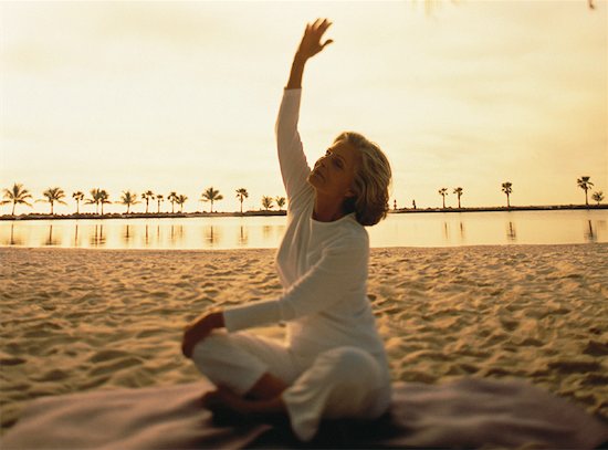 Mature Woman Practising Yoga on Beach at Sunset, Florida, USA Stock Photo - Premium Rights-Managed, Artist: George Contorakes, Image code: 700-00061213