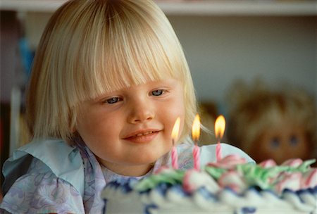 simsearch:600-00060932,k - Girl Looking at Candles on Birthday Cake Stock Photo - Rights-Managed, Code: 700-00061291