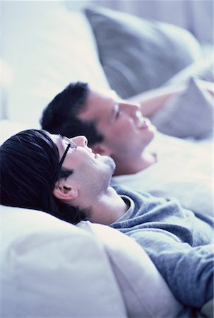 Male Couple Relaxing on Sofa Stock Photo - Rights-Managed, Code: 700-00061444