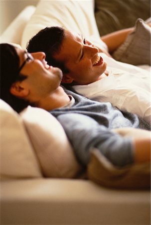 Male Couple Relaxing on Sofa Stock Photo - Rights-Managed, Code: 700-00061443