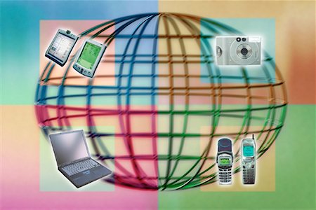Wire Globe with Camera, Cell Phones, Electronic Organizers and Laptop Computer Stock Photo - Rights-Managed, Code: 700-00061622