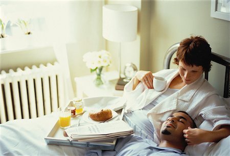 ron fehling bedroom - Couple Lying on Bed with Breakfast Tray Stock Photo - Rights-Managed, Code: 700-00061976