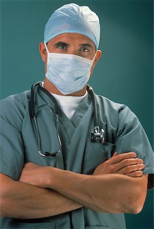 doctor with cap and mask - Portrait of Male Surgeon Wearing Surgical Mask with Arms Crossed Stock Photo - Rights-Managed, Code: 700-00062074