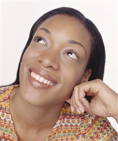 Portrait of Woman Resting Head on Hand Foto de stock - Con derechos protegidos, Código: 700-00062241