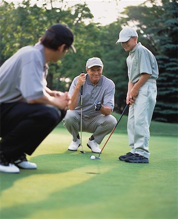 simsearch:693-06021485,k - Grandfather, Father and Son Playing Golf Stock Photo - Rights-Managed, Code: 700-00062375
