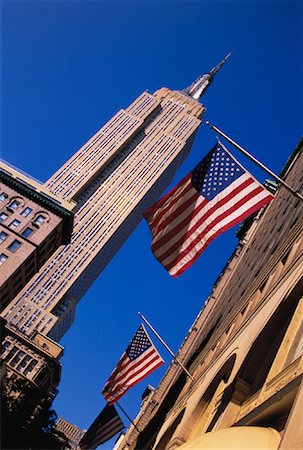 simsearch:700-00556657,k - Amerikanische Flaggen und Empire State Building, New York, NY, USA Stockbilder - Lizenzpflichtiges, Bildnummer: 700-00062389