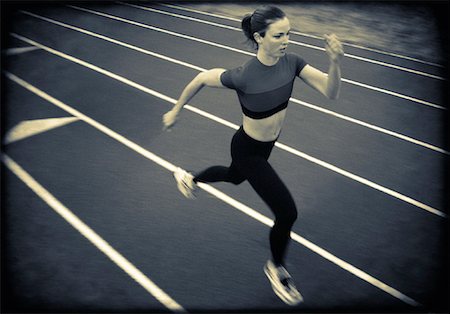 fitness black and white - Woman Running on Track Foto de stock - Con derechos protegidos, Código: 700-00062443