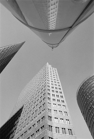 simsearch:700-06144832,k - Looking Up at Buildings and Sky Potsdamer Square, Berlin, Germany Stock Photo - Rights-Managed, Code: 700-00062677