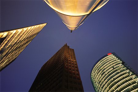 simsearch:6126-08644568,k - Looking Up at Buildings at Dusk Potsdamer Square Berlin, Germany Stock Photo - Rights-Managed, Code: 700-00062684