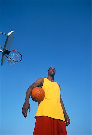 simsearch:700-00032308,k - Man Holding Basketball Outdoors Foto de stock - Con derechos protegidos, Código: 700-00062902