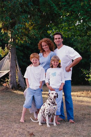 female dalmatian - Portrait of Family and Dog Outdoors Stock Photo - Rights-Managed, Code: 700-00074064