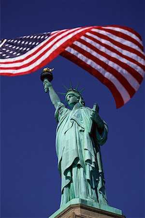 statue of liberty on the flag - Statue de la liberté et drapeau américain New York, New York, USA Photographie de stock - Rights-Managed, Code: 700-00074612