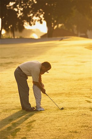 Father Giving Son Golfing Lessons Stock Photo - Rights-Managed, Code: 700-00074656