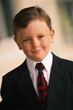 simsearch:700-00012677,k - Portrait of Boy Dressed as Businessman Stock Photo - Rights-Managed, Code: 700-00074661