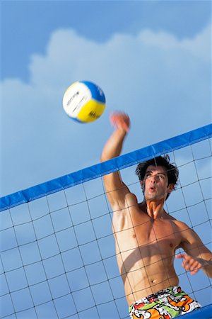 Man Jumping to Spike Volleyball Stock Photo - Rights-Managed, Code: 700-00074751