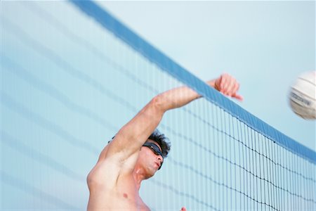 Man Jumping to Spike Volleyball Stock Photo - Rights-Managed, Code: 700-00074752