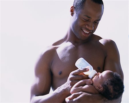Father Feeding Baby from Bottle Stock Photo - Rights-Managed, Code: 700-00074768
