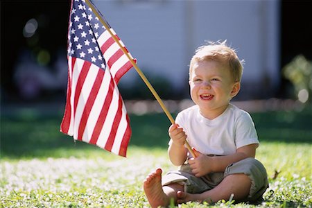 simsearch:700-00079723,k - Portrait of Child Sitting in Field, Holding American Flag Stock Photo - Rights-Managed, Code: 700-00074984