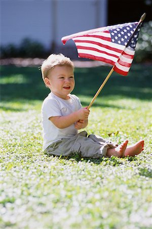 simsearch:700-00079723,k - Portrait of Child Sitting in Field, Holding American Flag Stock Photo - Rights-Managed, Code: 700-00074983
