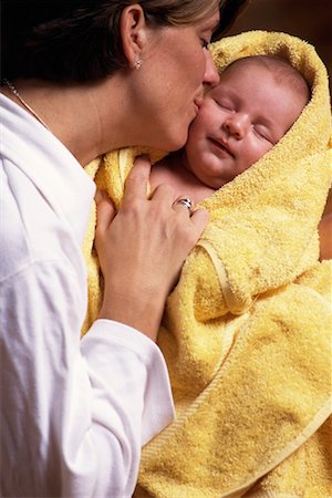 simsearch:700-00074987,k - Mother Kissing Baby Wrapped in Towel Stock Photo - Rights-Managed, Code: 700-00075000