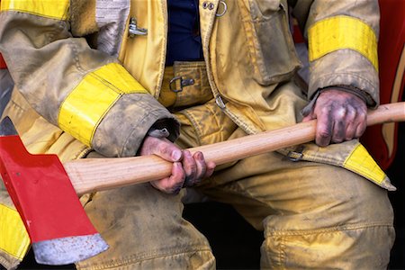 simsearch:700-00076137,k - Close-Up of Firefighter Holding Axe Foto de stock - Direito Controlado, Número: 700-00075534